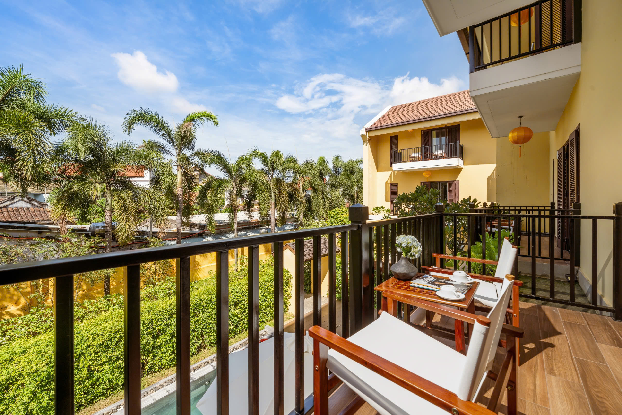 Balcony overlooking the garden at Antique Hoi An Villa
