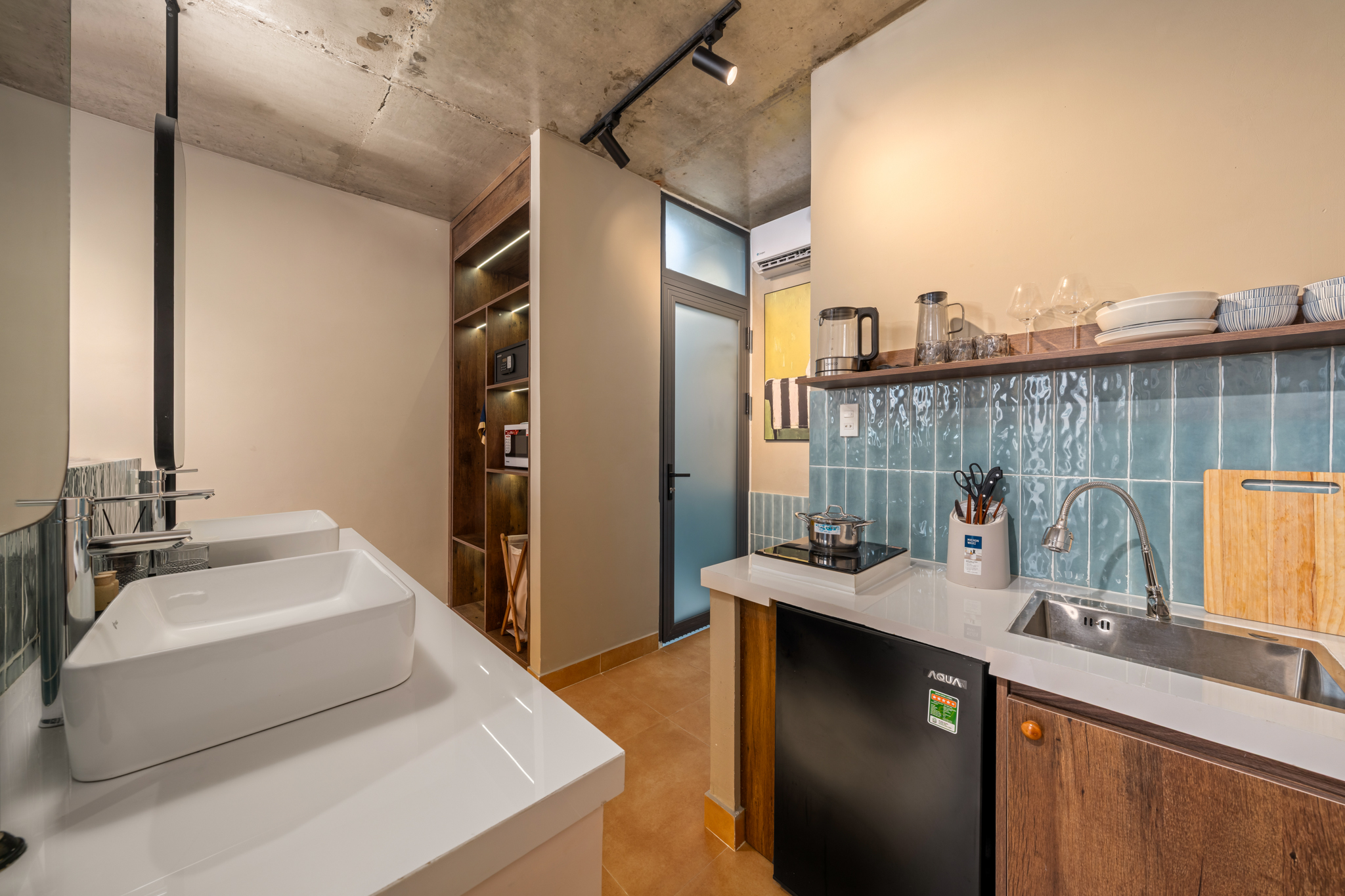 Kitchen and wash basin at Orchids Villas