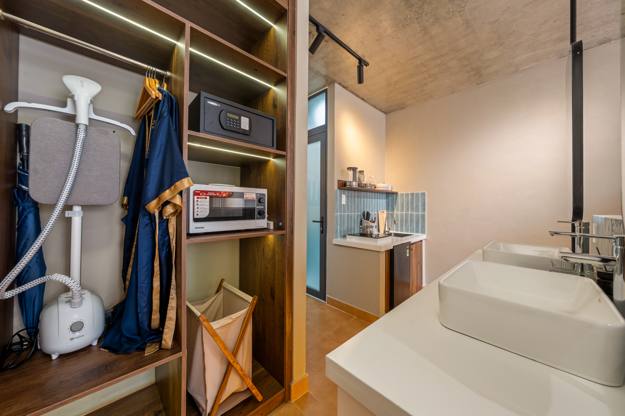 Wardrobe and guest amenities at Orchids Villas
